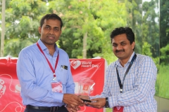 giving momento by principal Mr.Jeril Cherian